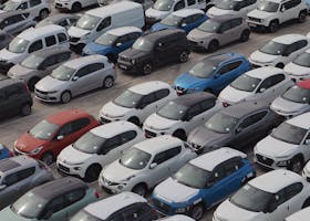Aerial shot of a crowded car park in Barcelona, showcasing diverse vehicles.